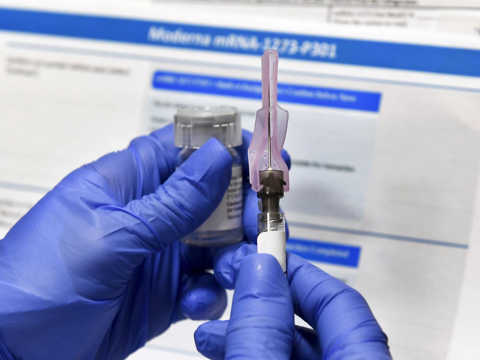 Debate begins for who's first in line for COVID-19 vaccine